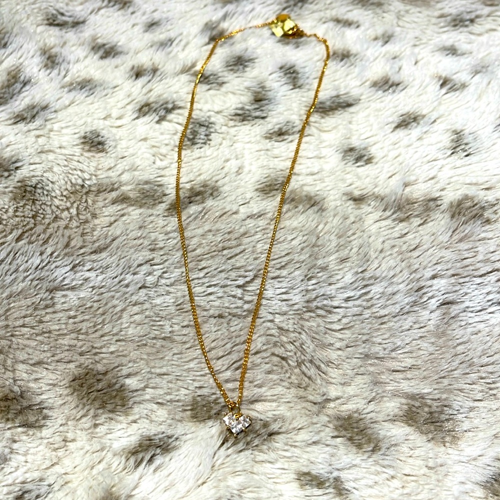 Gold choker with diamond heart pendant